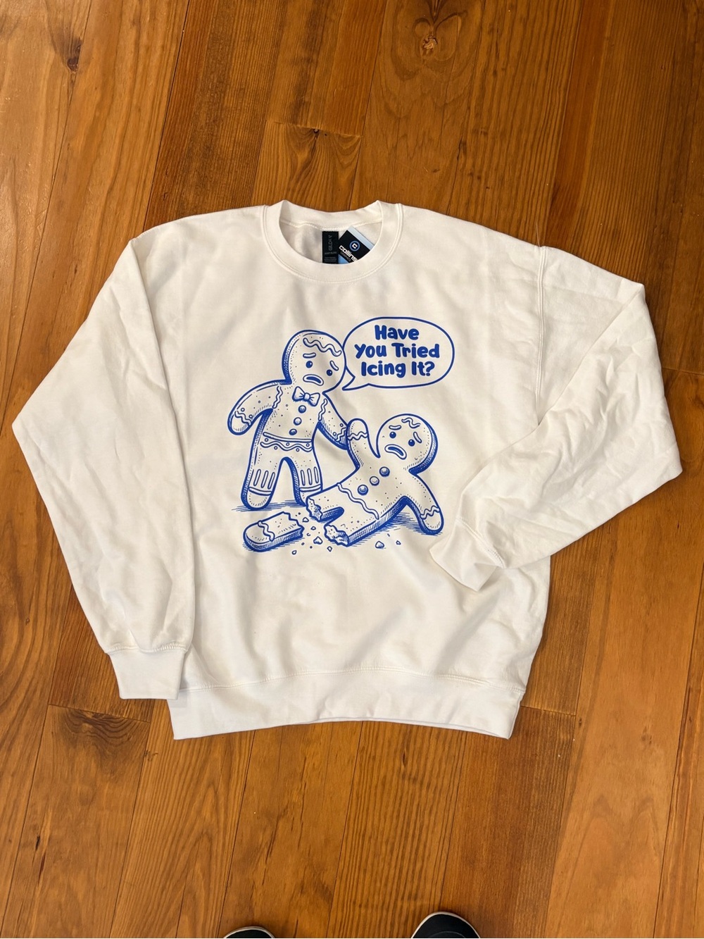 Gildan White Crewneck Sweatshirt with Blue Gingerbread Graphic